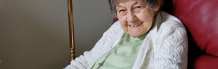 Elderly Sister in red chair