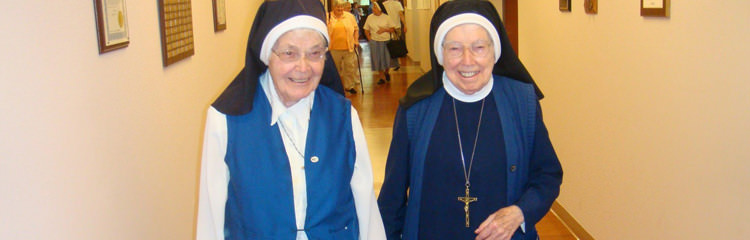 Elderly sisters walking