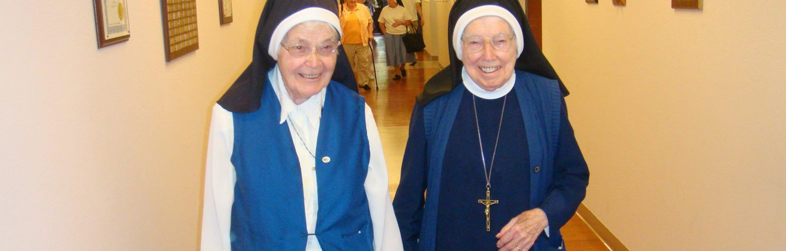 Elderly sisters walking